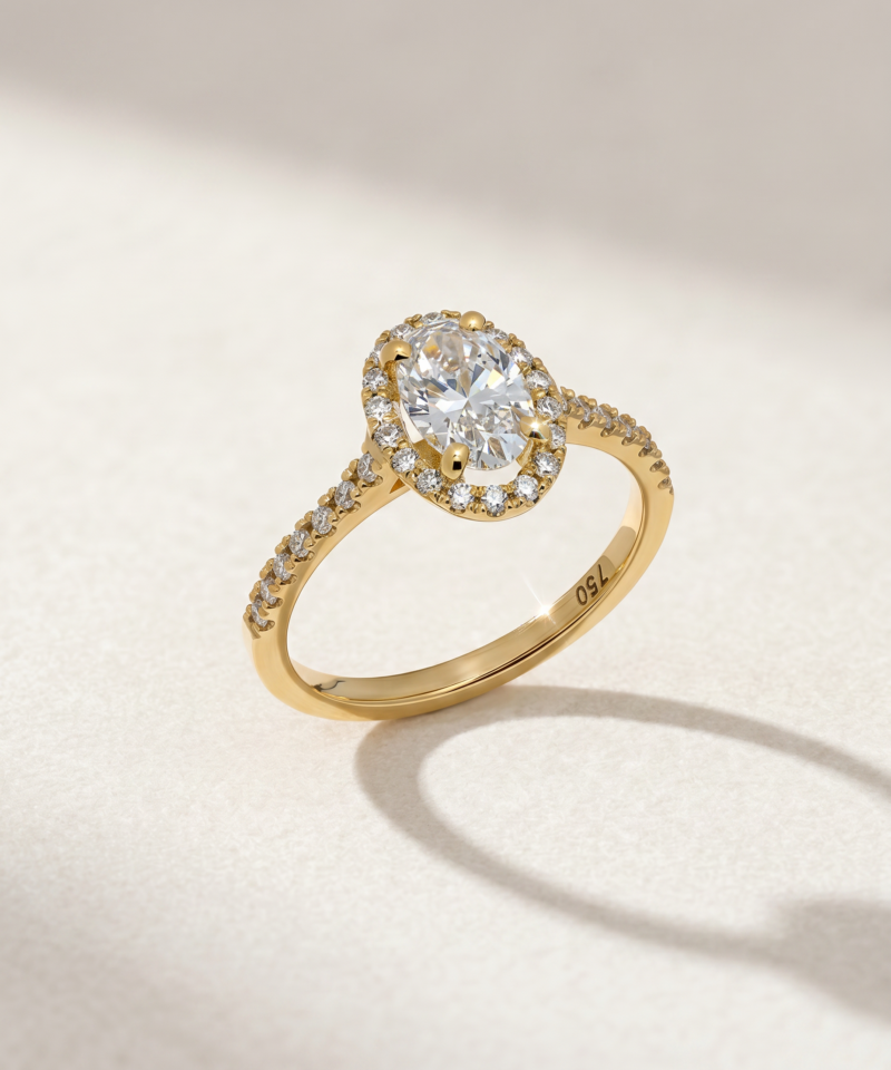 Oval Diamond Halo Ring in K18 Yellow Gold
