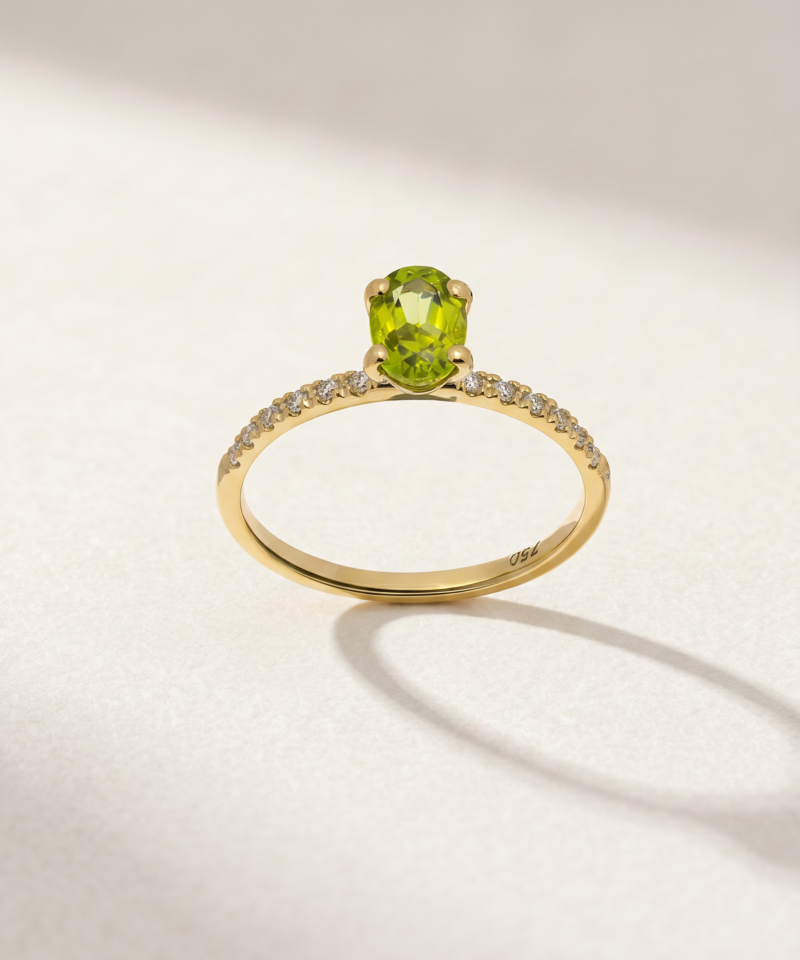 Alternative view of Oval-Cut Peridot and Diamond Ring in K18 Yellow Gold