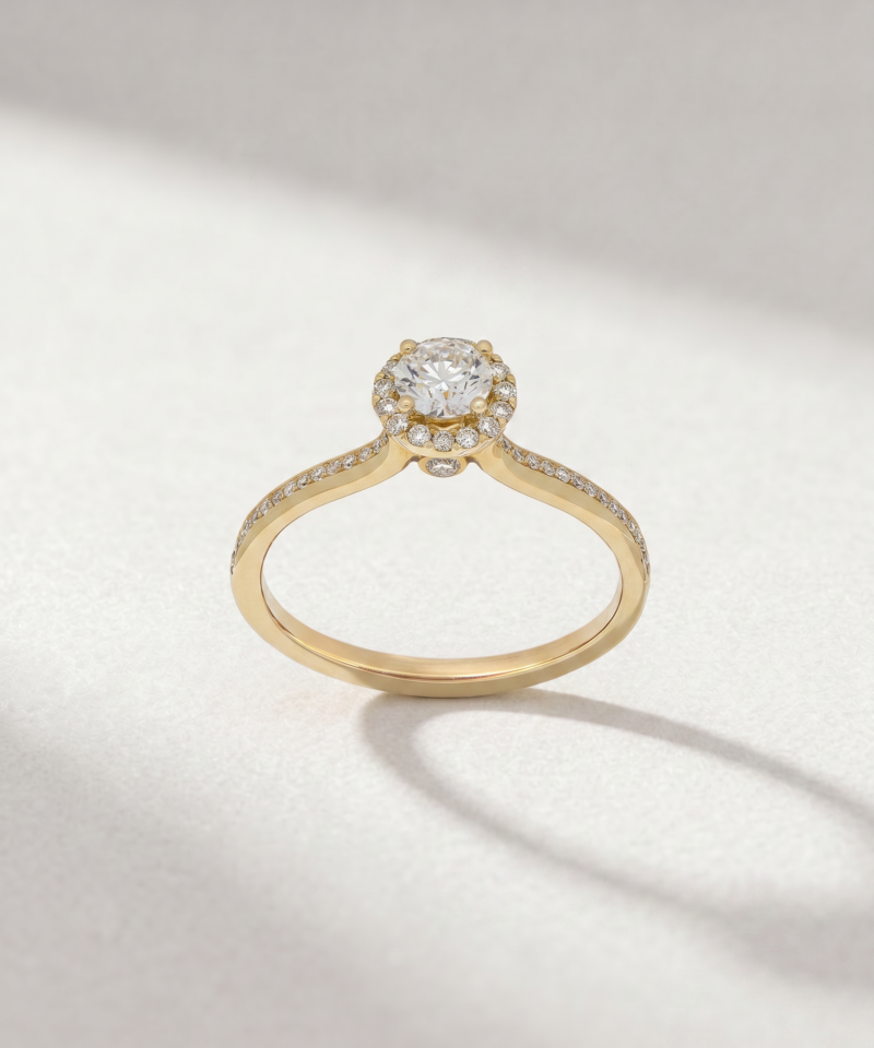 Alternative view of Round-Cut Diamond Halo Ring in K18 Yellow Gold