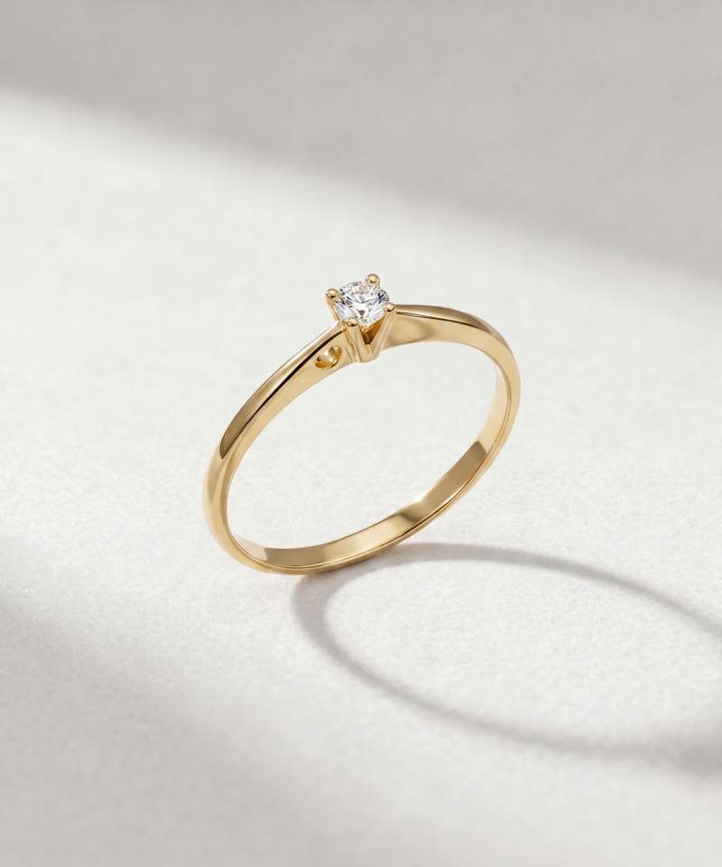 Round-Cut Diamond Solitaire Ring with Heart Detail in K18 Yellow Gold