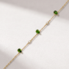 Green tourmaline and diamond bracelet in K14 yellow gold