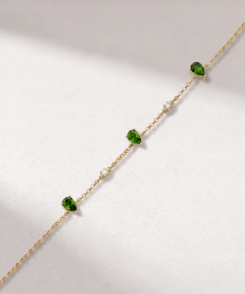 Green tourmaline and diamond bracelet in K14 yellow gold