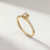 Baguette-cut diamond halo ring in K14 yellow gold