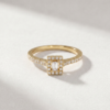 Baguette-cut diamond halo ring in K14 yellow gold