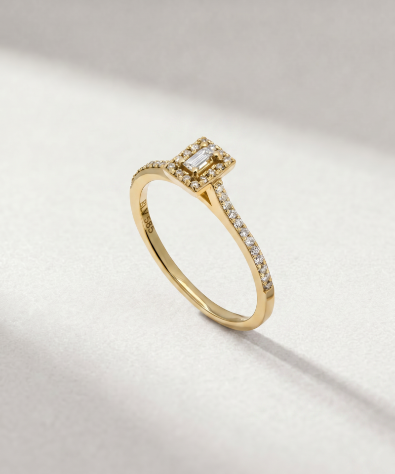 Baguette-cut diamond halo ring in K14 yellow gold