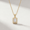 Emerald-cut diamond halo pendant in K14 yellow gold