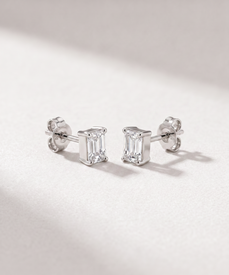 Emerald-cut diamond stud earrings in white gold