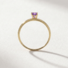 Emerald-cut amethyst ring with cubic zirconia in K14 yellow gold