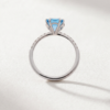 Blue topaz and diamond ring in K18 white gold