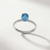 Oval-cut blue topaz and diamond ring in K18 white gold