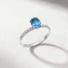 Oval-cut blue topaz and diamond ring in K18 white gold