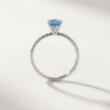 Oval-cut blue topaz and diamond ring in K18 white gold